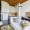 living room with couch table seating and view of a kitchen